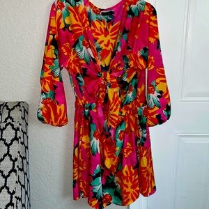 Floral shorts romper from boohoo.Has an elastic band around the stomach.